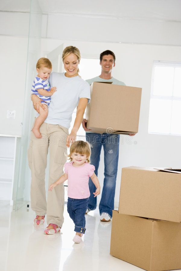 Happy family moving into new home